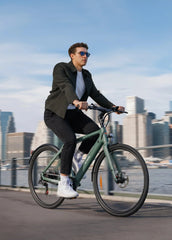 Man riding ENGWE MapFour N1 Air Electric Bike in urban area - Pogo cycles UK