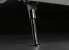 Close-up of a metallic black VIPCOO VS2 Pro machinery leg extended downward against a dark studio background.