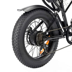 Close-up of a Ridstar Q20 Mini bicycle wheel with thick tire on a white background