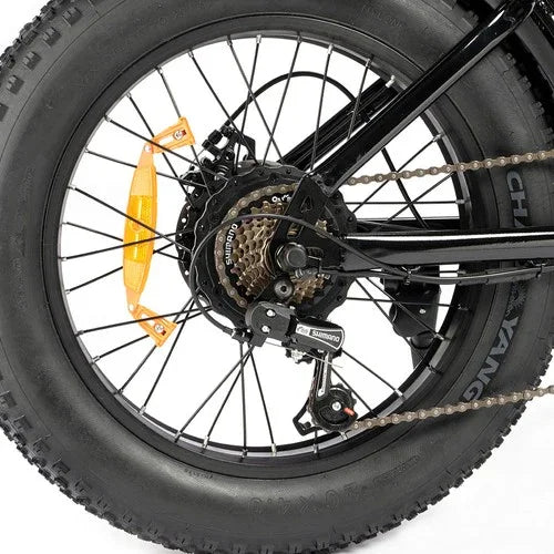 Close-up of a bicycle wheel with a white background