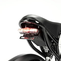 Close-up of a Ridstar Q20 Mini Electric Bike's rear light and seat on a white background