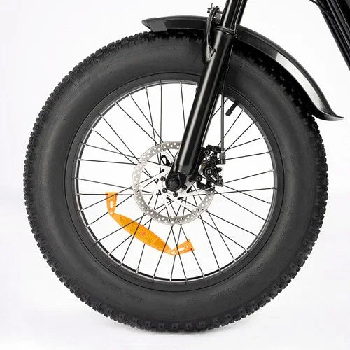 Close-up of a Ridstar Q20 Mini Electric Bike wheel with a white background