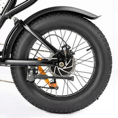 Close-up of a Ridstar Q20 Mini Electric Bike wheel with thick tire on a white background