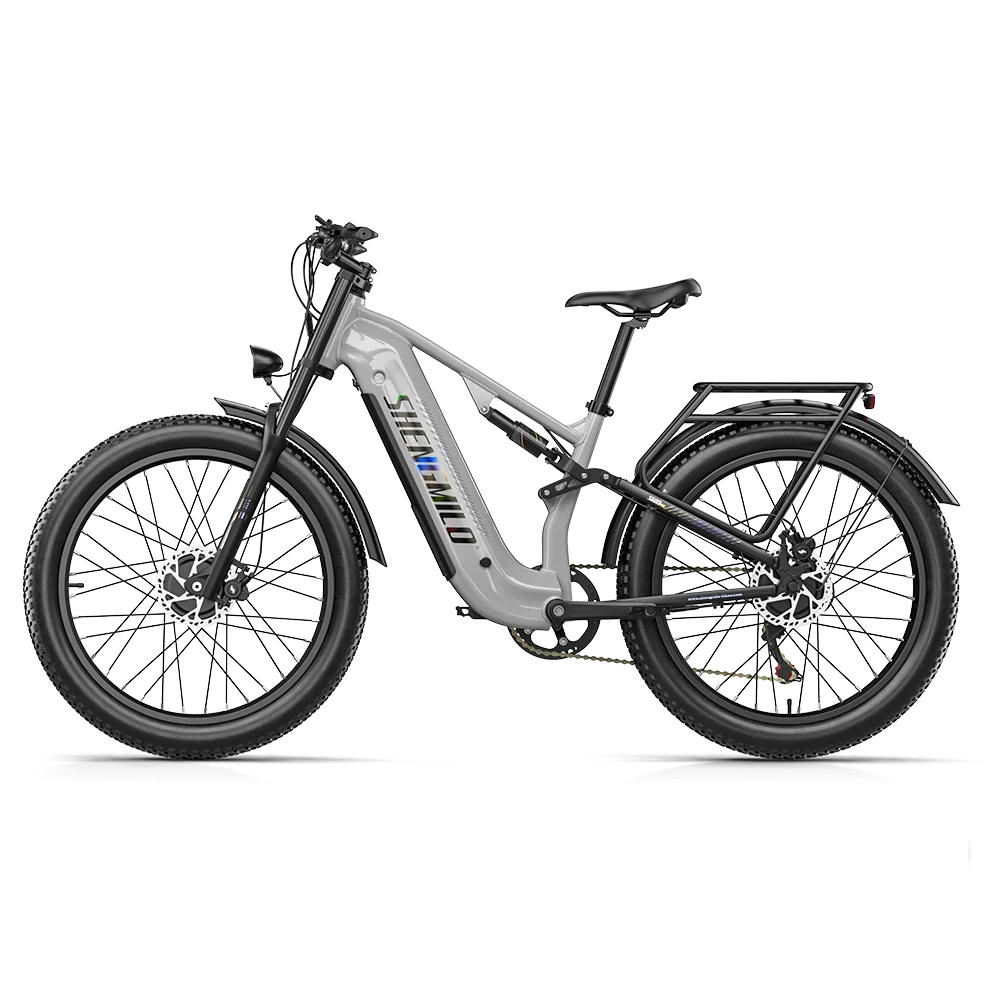 A silver and black Shengmilo S600Pro Dual Motor electric fat tire bike with a rear cargo rack, shown from a side profile on a white background.
