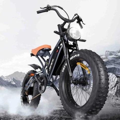 Jansno X50 electric bike black and orange side view on a mountain trail