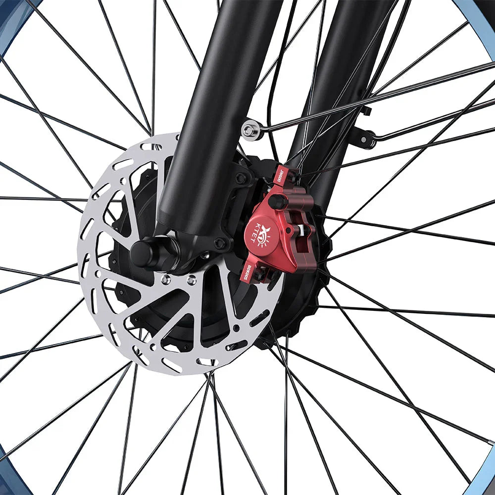 Close-up of a DUOTTS N26 Electric Bike wheel with a red brake caliper and disc rotor.
