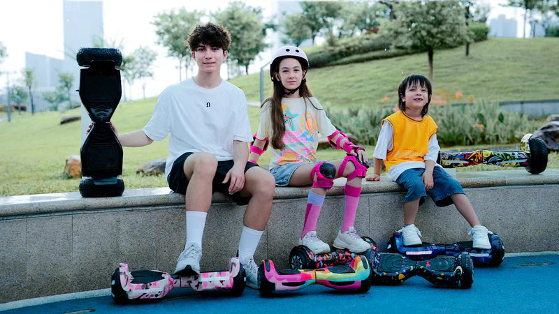 Three children with hoverboards in a park setting - Hoverboard V8 8.5" Off Road  - Self Balancing System