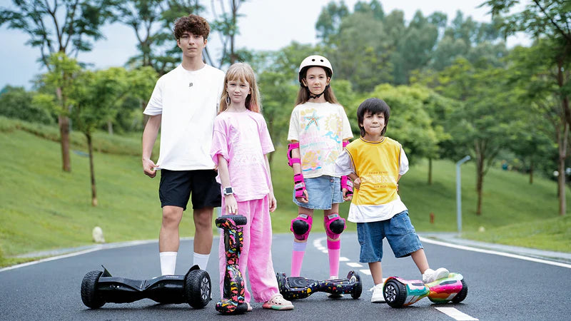 Four children with hoverboards on a road in a park setting - Hoverboard V8 8.5" Off Road  