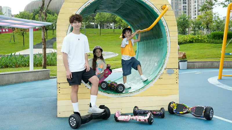 Children playing with hoverboards in a park setting - Hoverboard V8 8.5" Off Road  