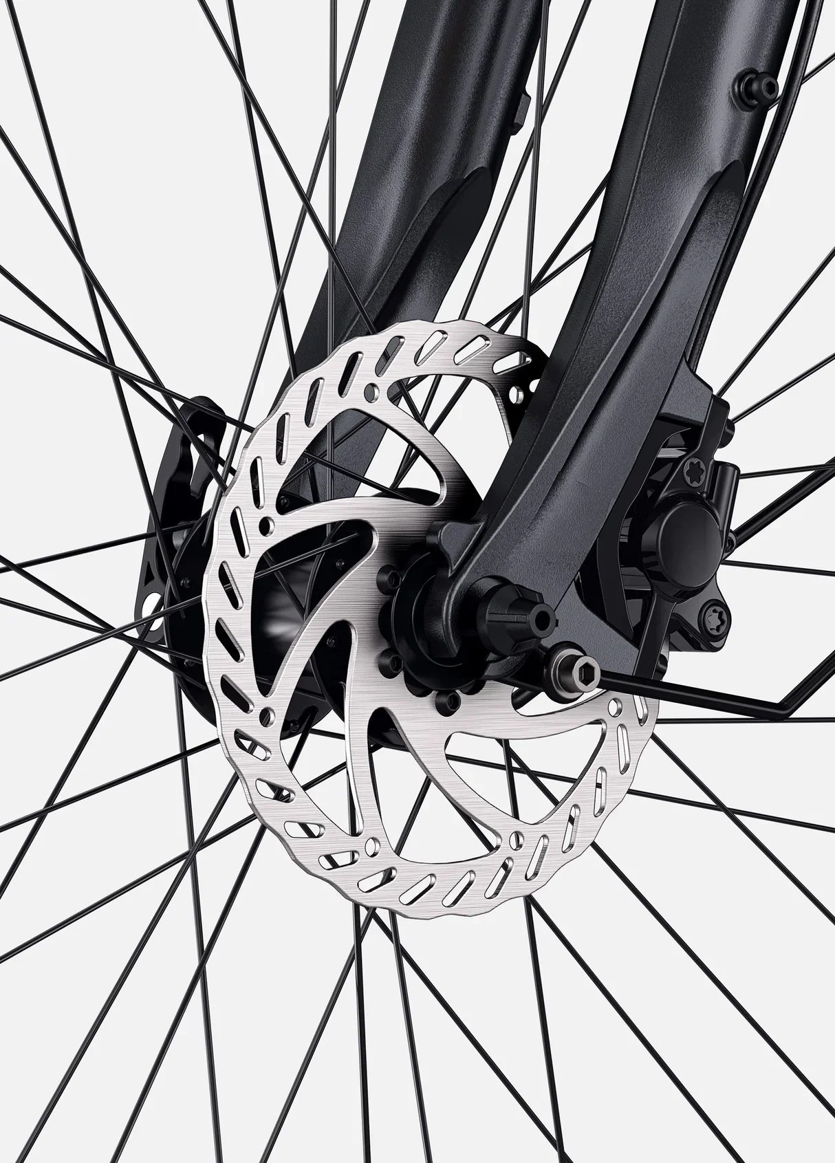 Close-up of a bicycle disc brake system on a white background
