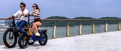 Ridstar MN26 Electric Bike - A couple ride this bicycle near beach location.